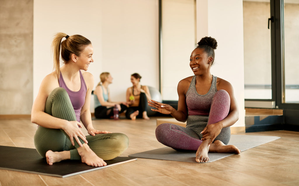 Woman talking at exercise class