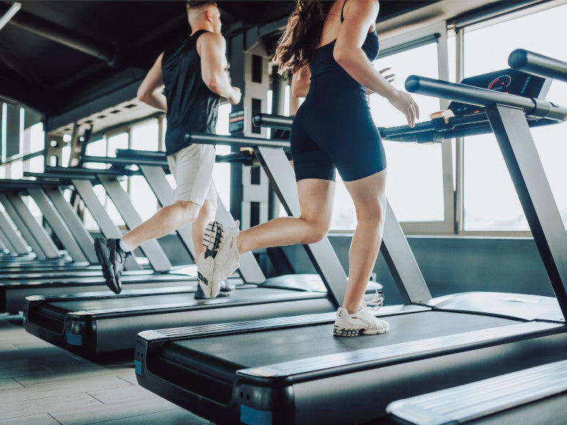 woman running on treadmill