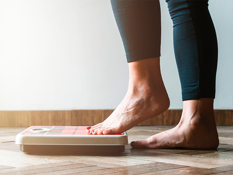 Checking bodyweight on scales