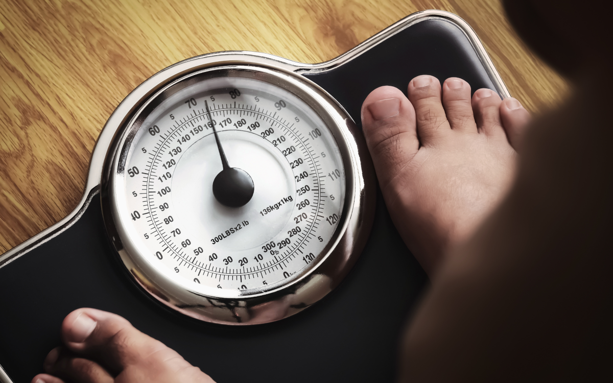 someone stood on scales